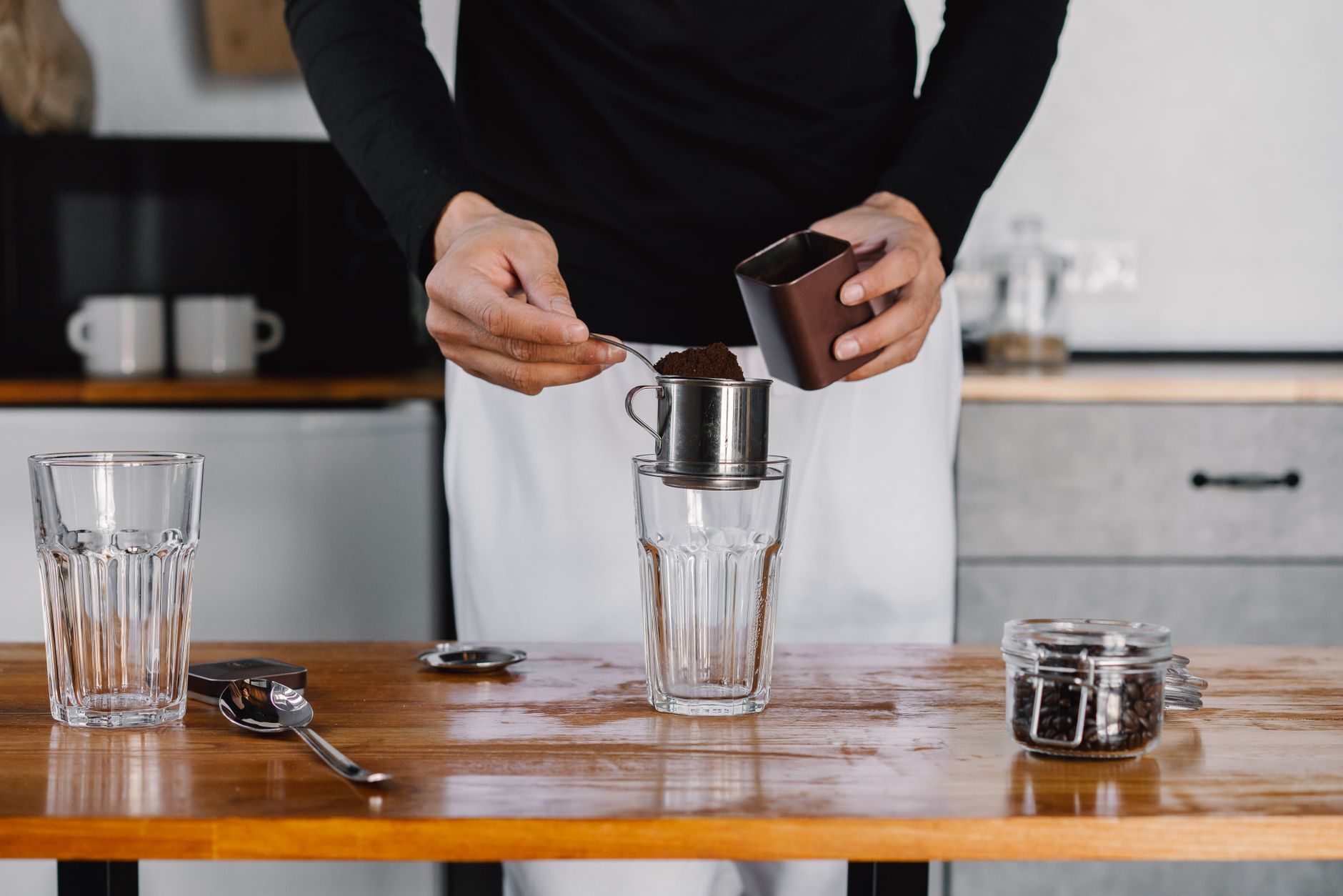 coffee grounds on white surface uniform particle size drip