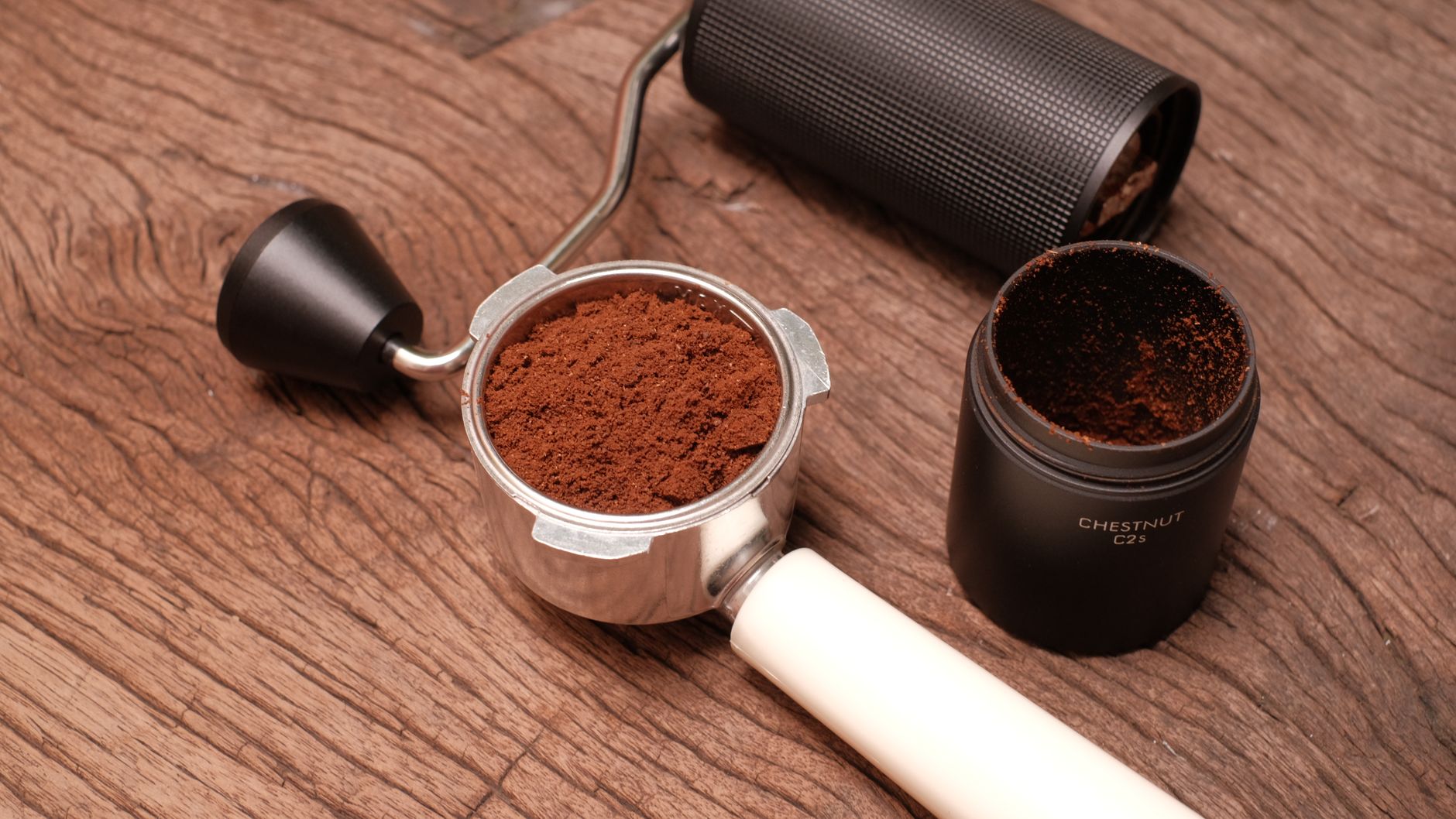conical burr grinder espresso grounds closeup