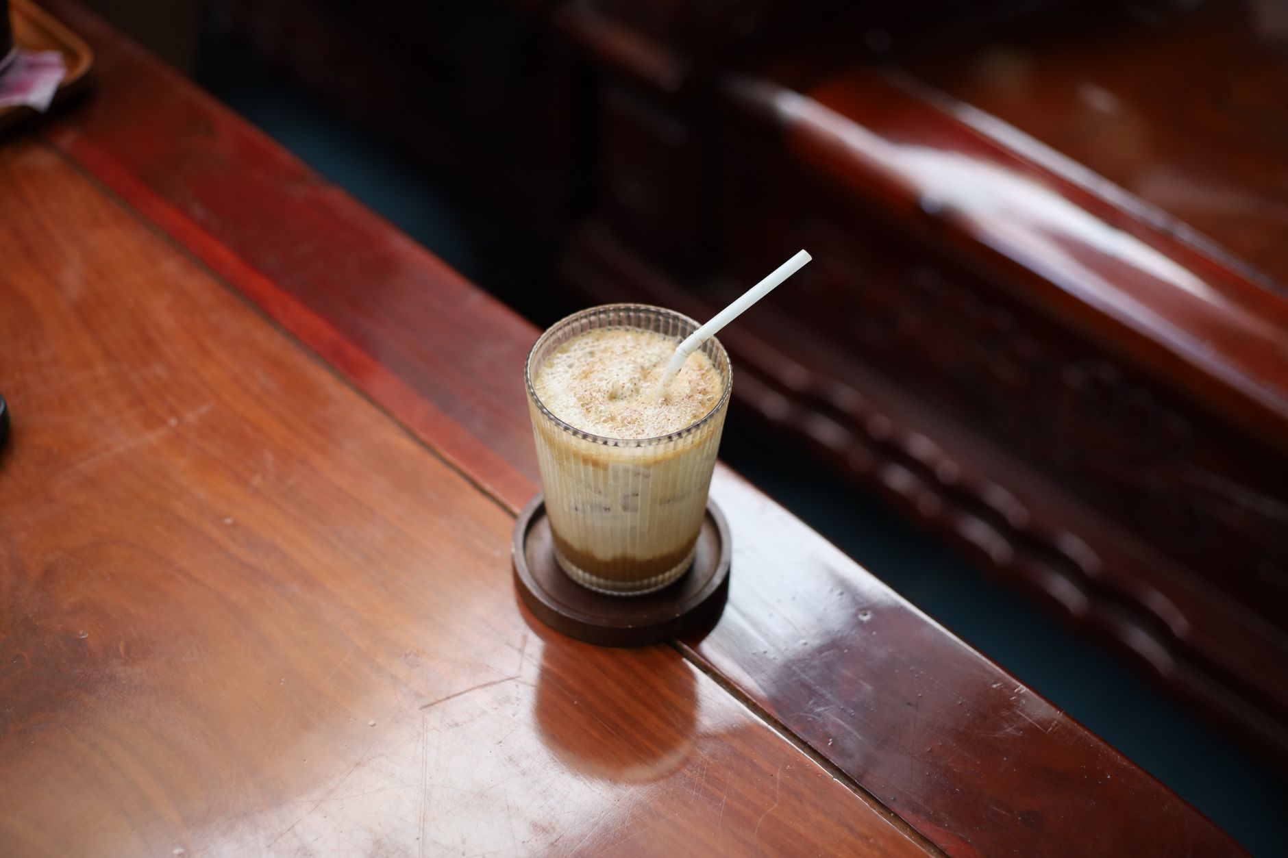 dalgona whipped coffee foam layered iced milk glass
