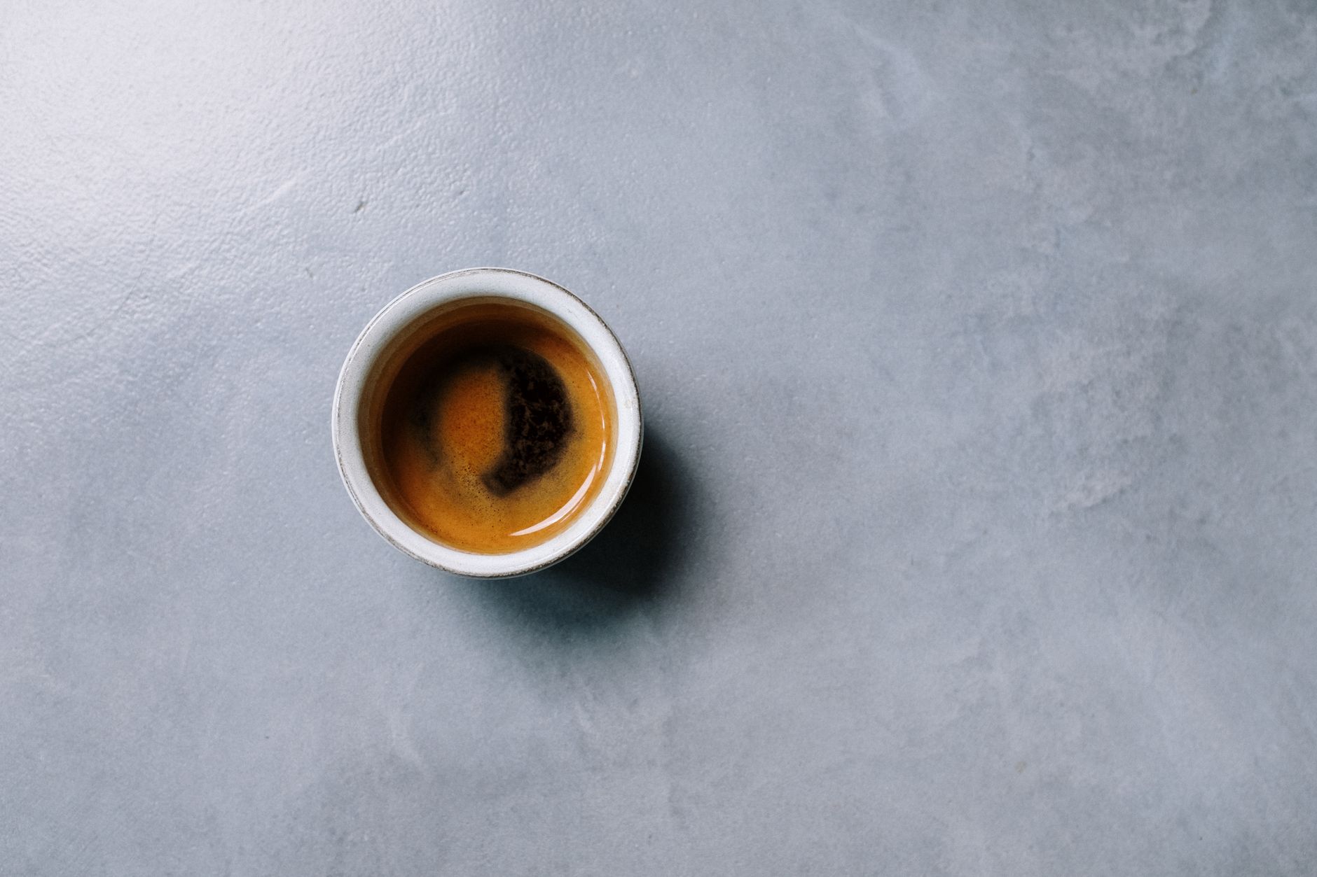 espresso shot golden crema close-up cup