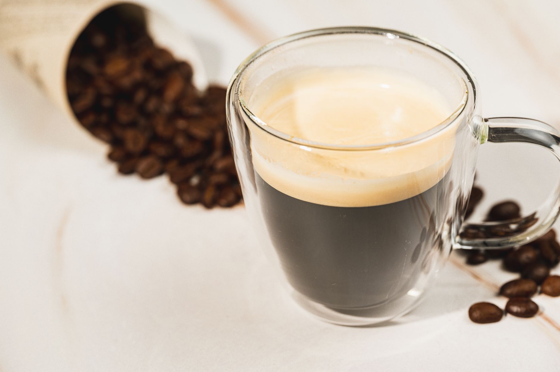 espresso shot golden crema dripping portafilter