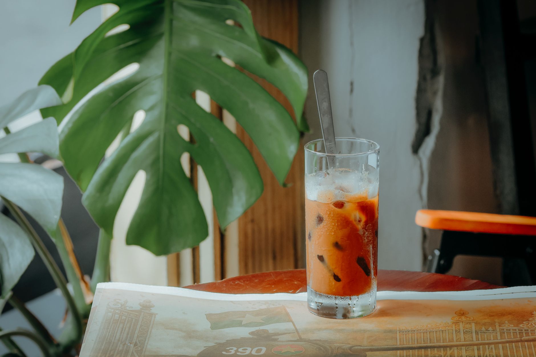 clear tall glass ice cubes tonic water espresso layered