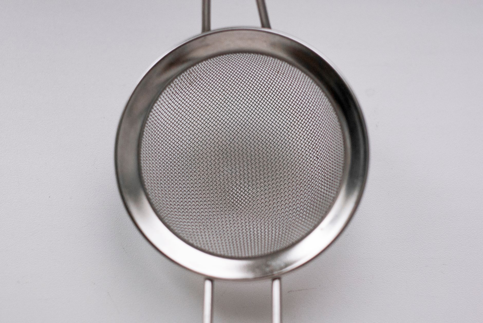 french press stainless steel plunger closeup