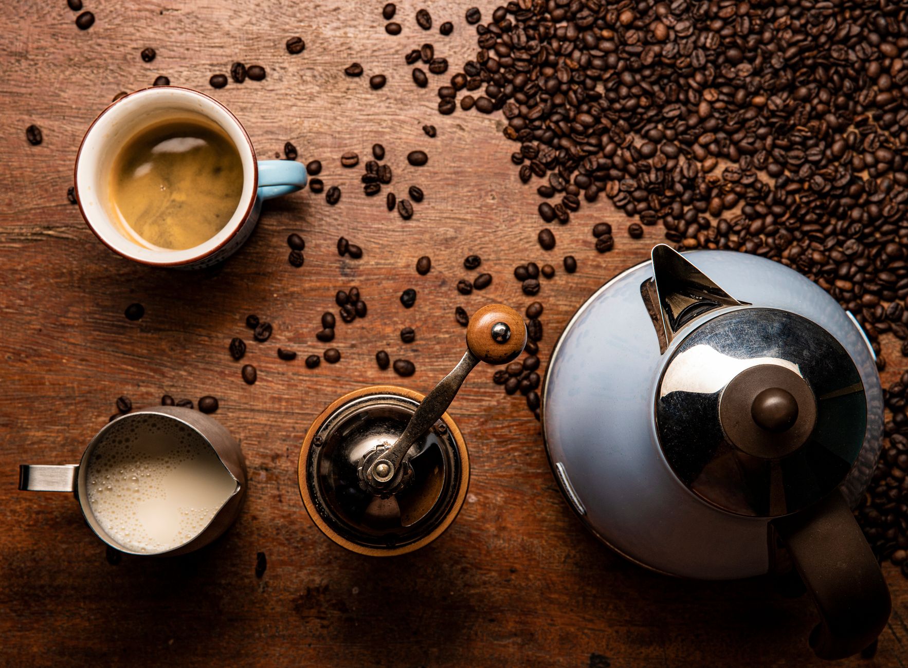 french press plunger pressed halfway coffee grounds