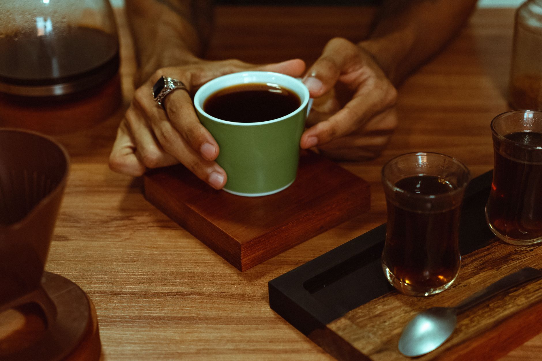 hario v60 kalita wave chemex drippers comparison on wooden surface