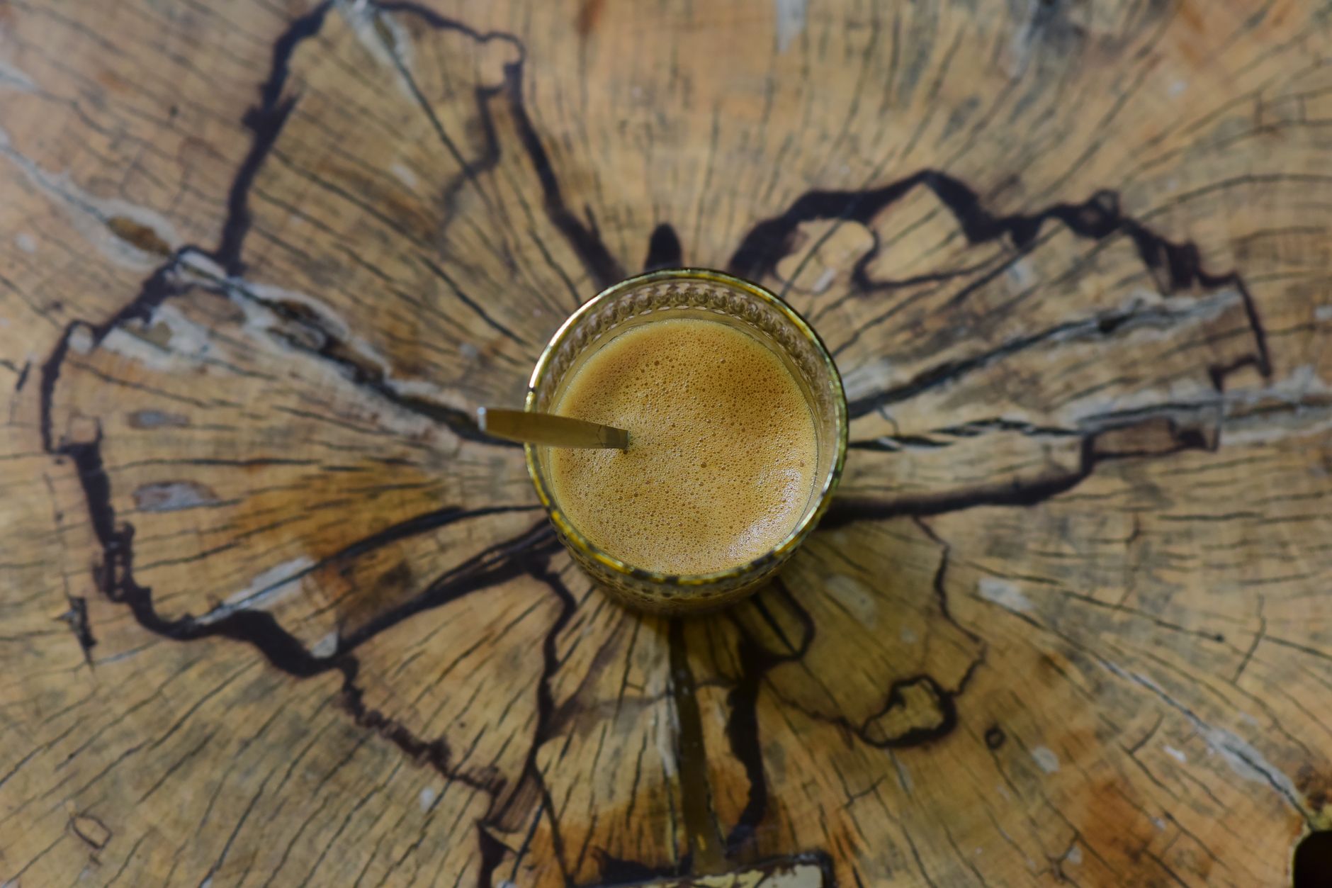 espresso shot golden crema in demitasse cup