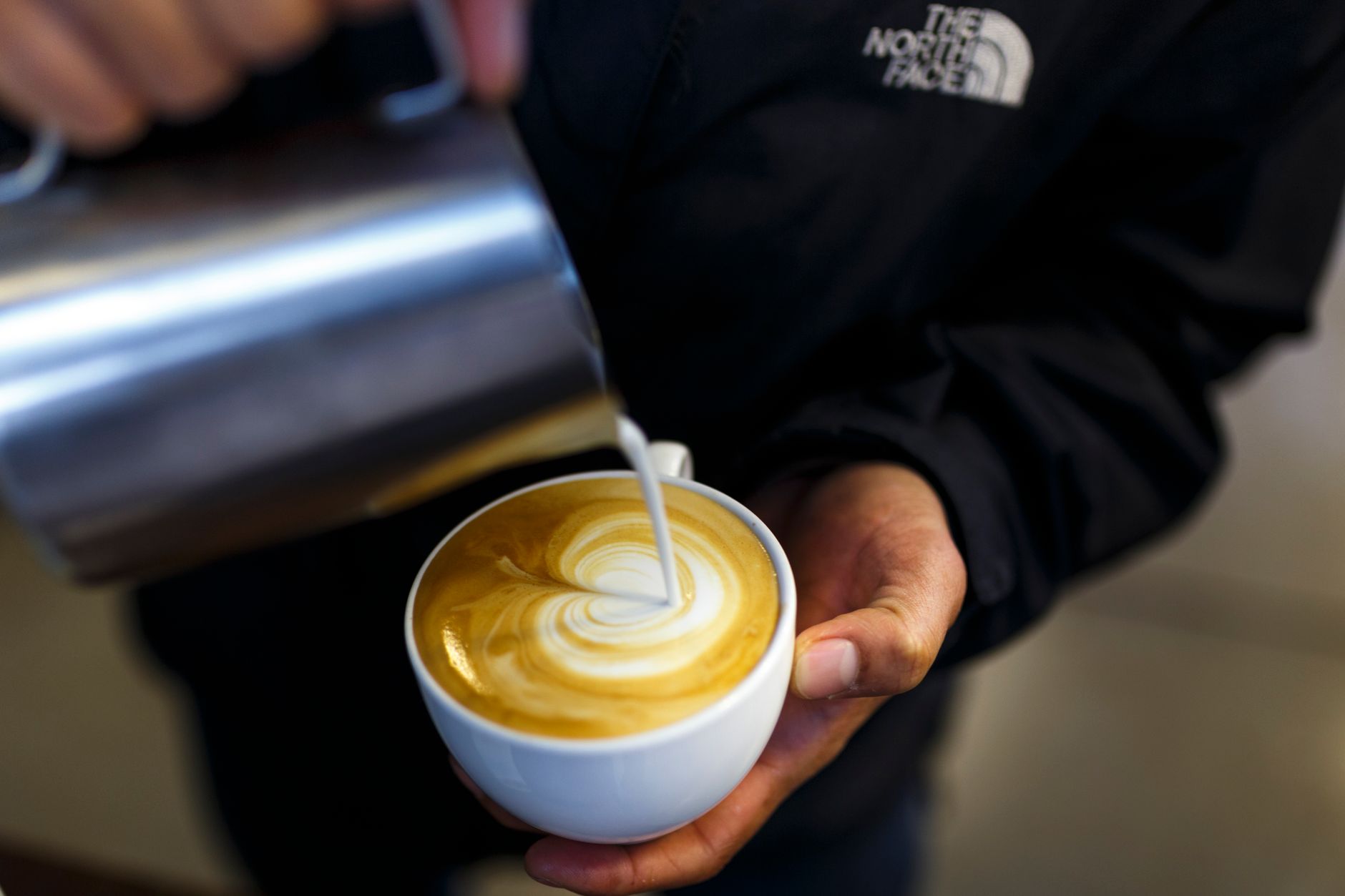 latte art heart pour pattern espresso cup overhead