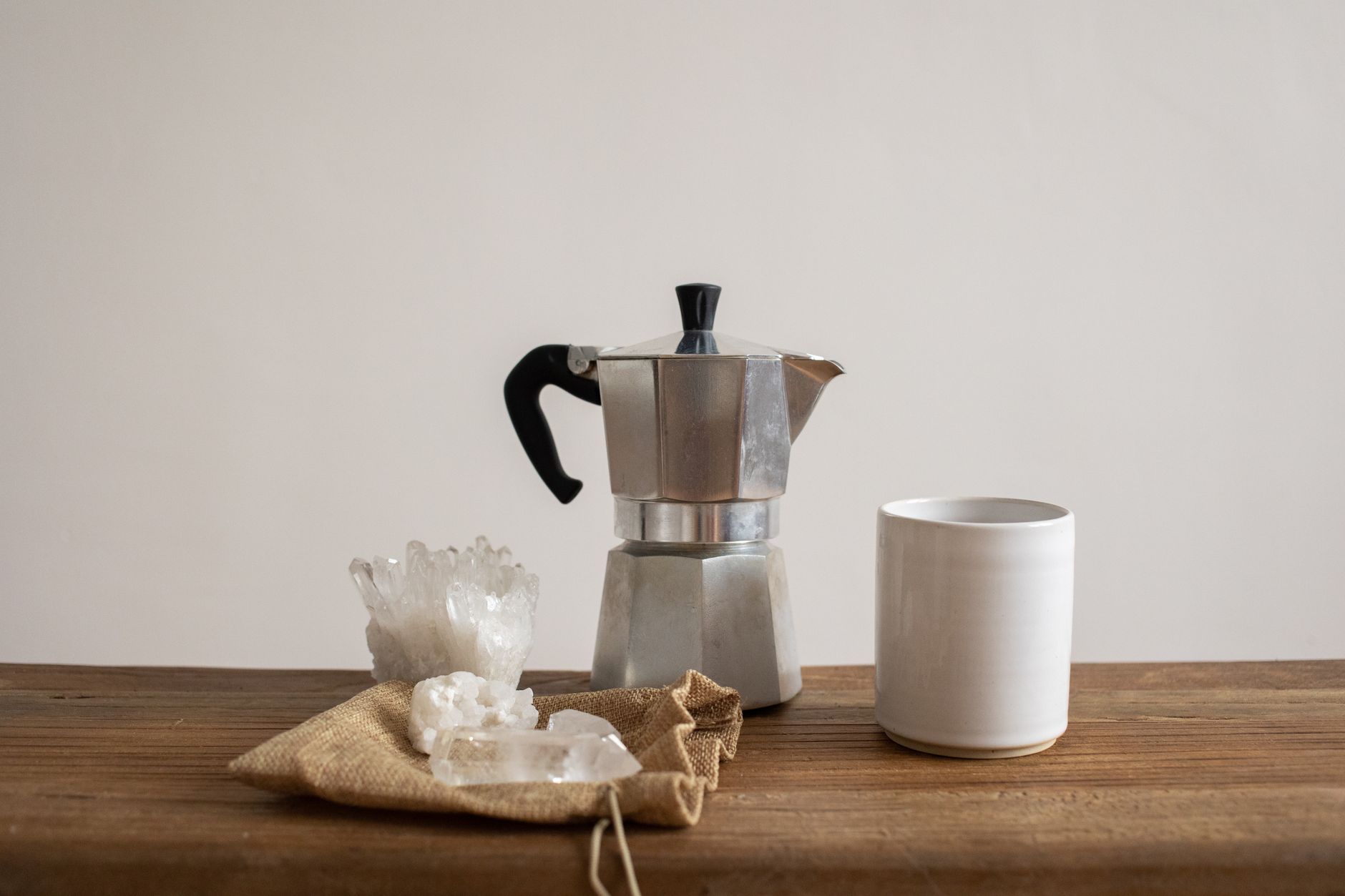 moka pot coffee poured into espresso cup dark roast