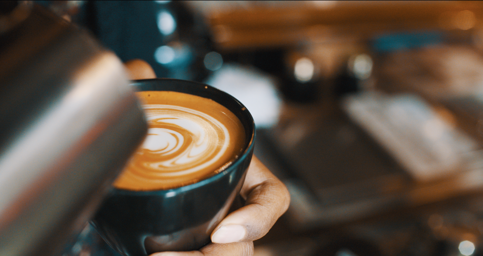 rosetta latte art pattern espresso cup barista overhead
