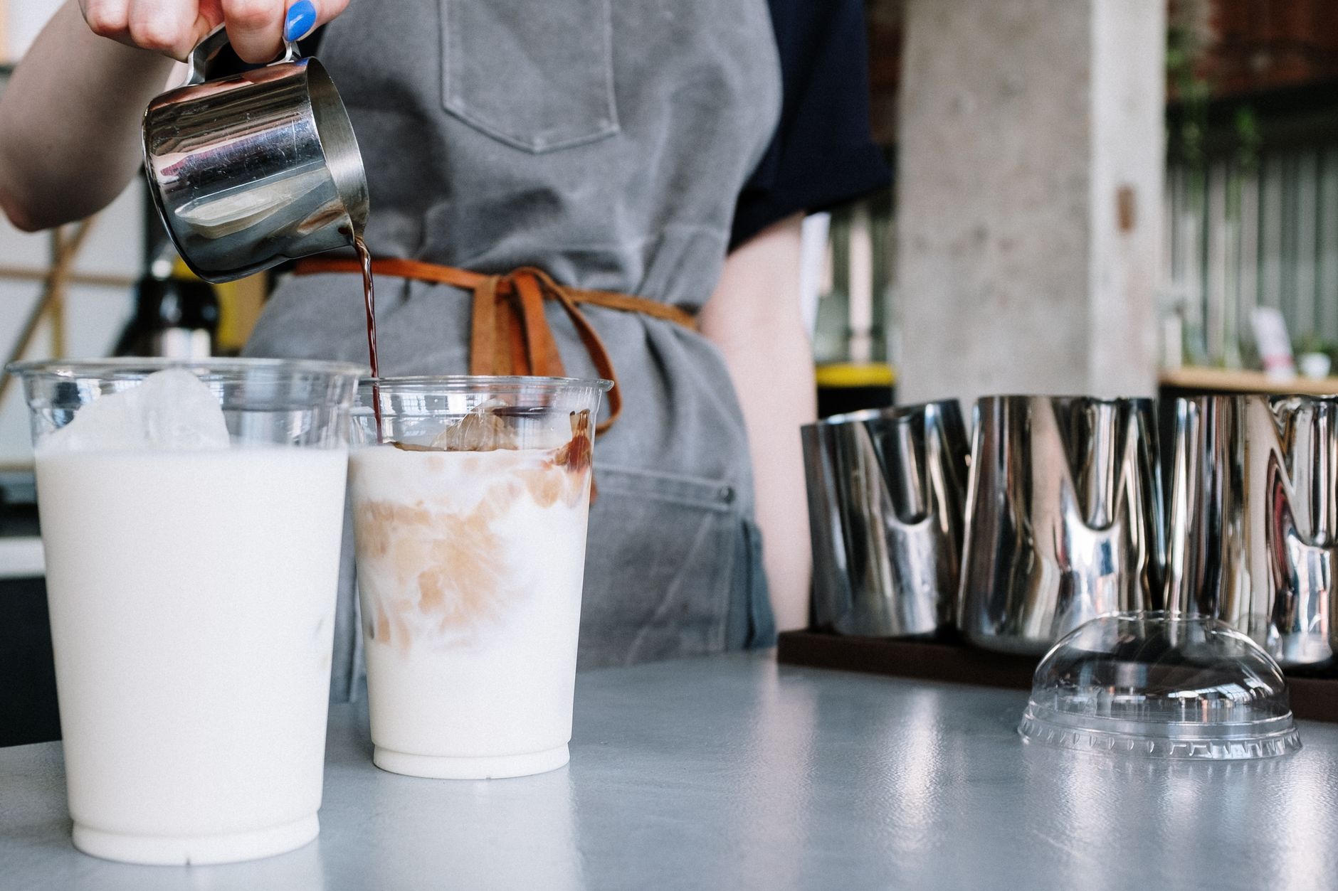 iced lavender latte tall glass purple syrup swirl ice