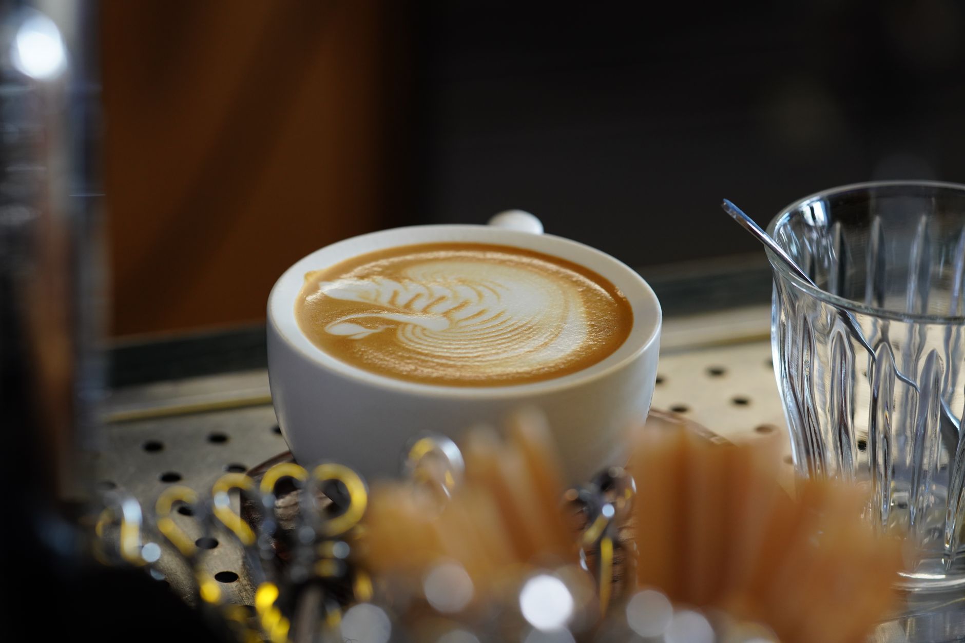 latte art oat milk pouring espresso cup