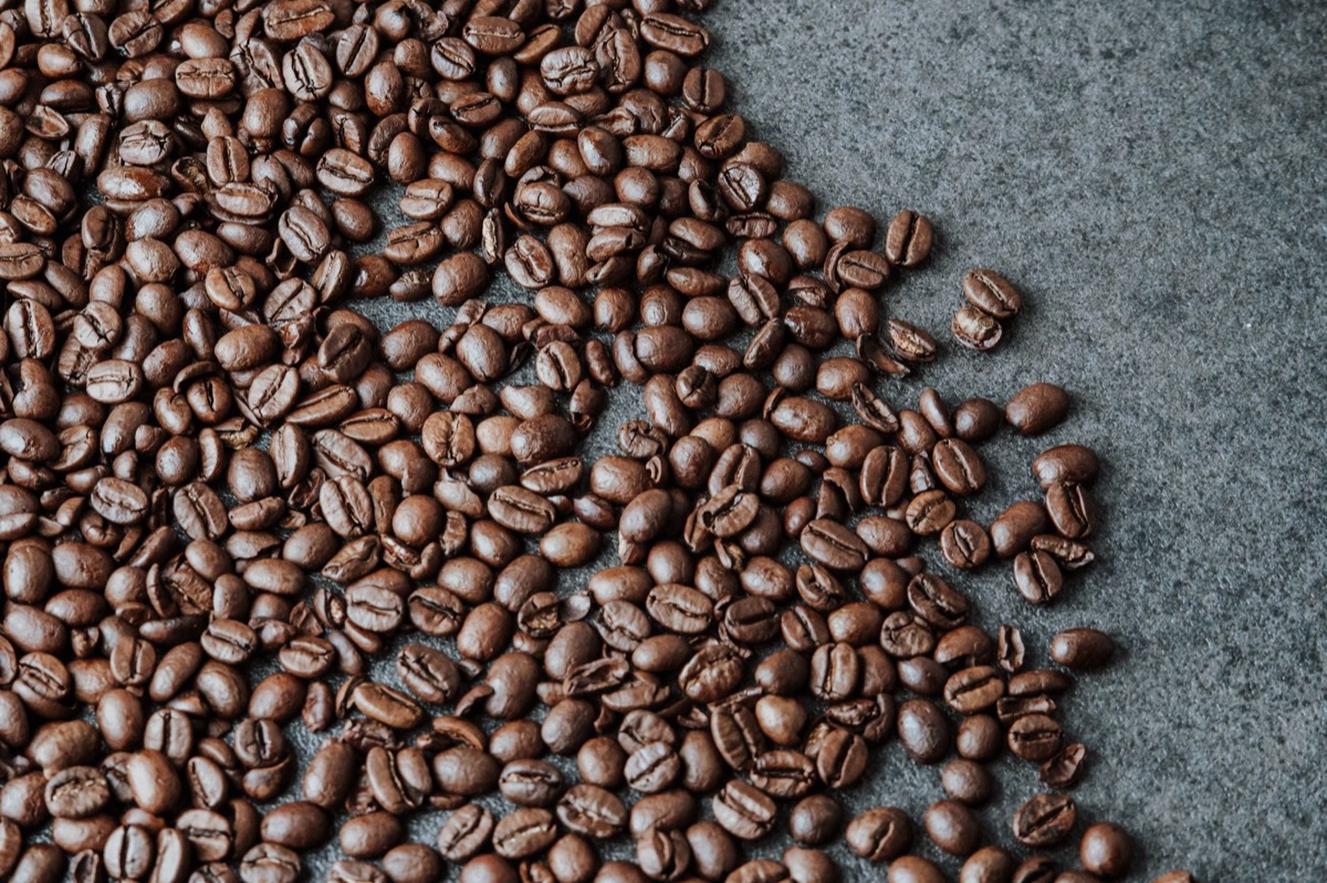 coffee grounds on white surface showing particle size distribution