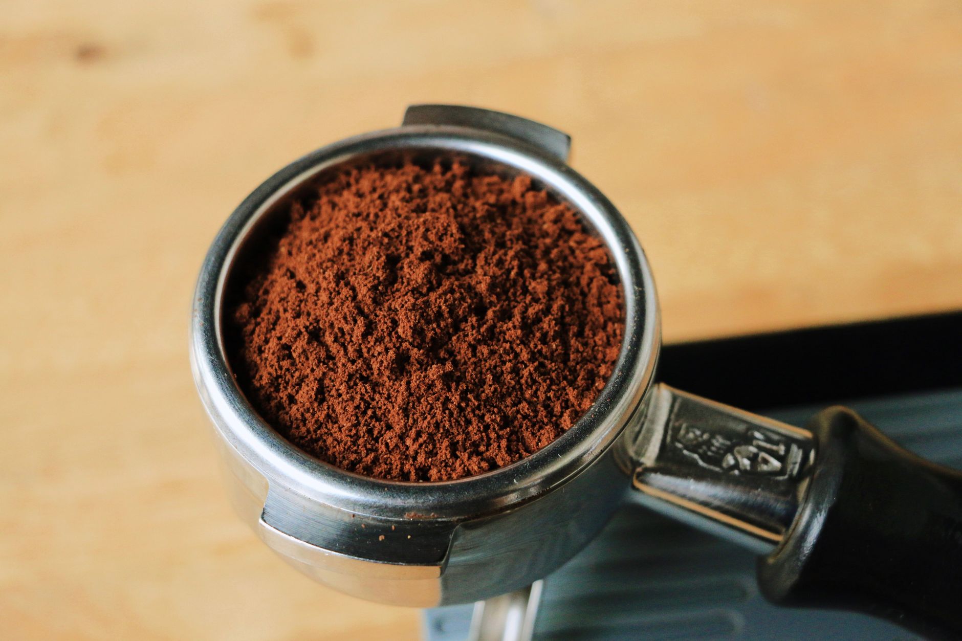 stovetop percolator bubbling coffee grounds close-up