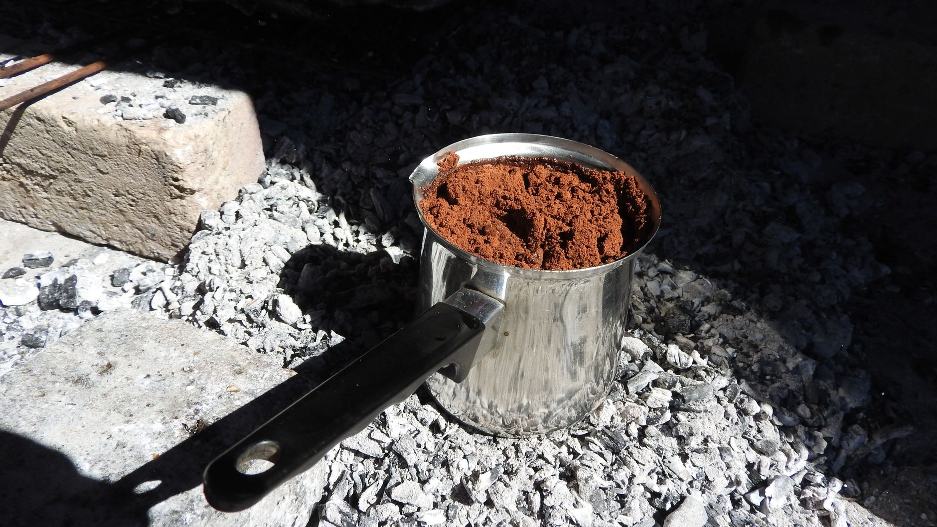 espresso puck coffee grounds tamped portafilter basket
