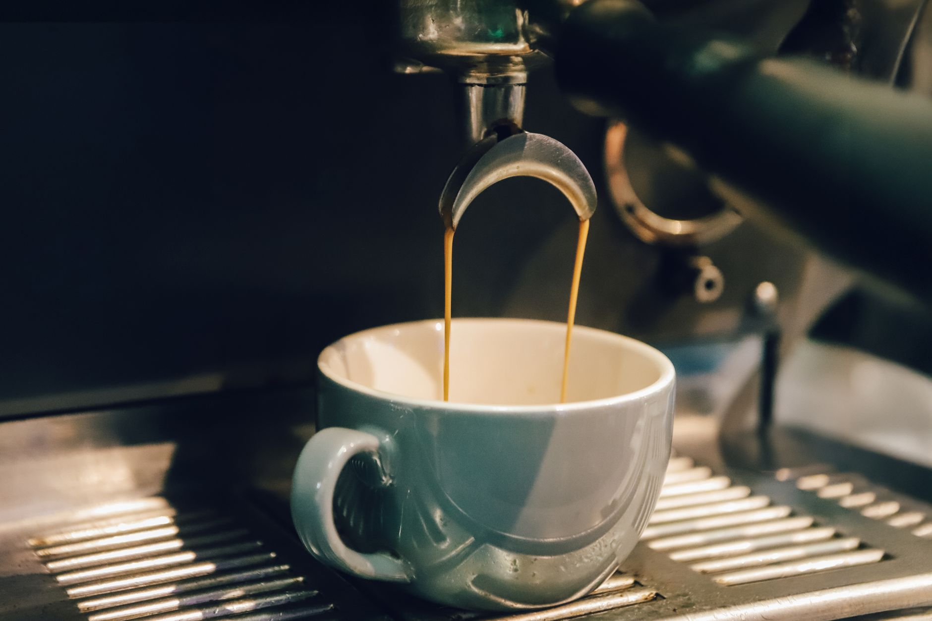 espresso puck coffee grounds tamped portable basket